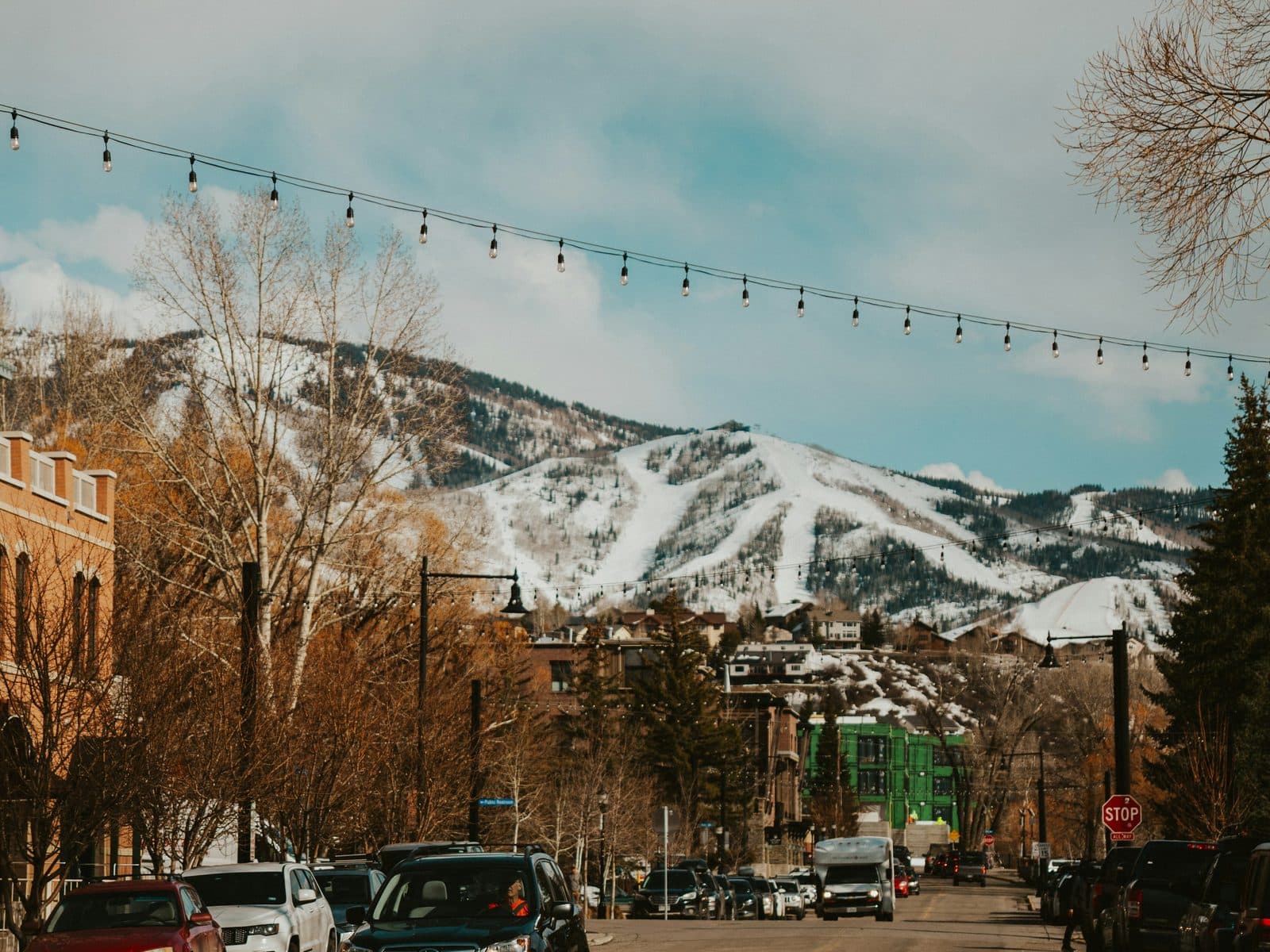 Downtown Steamboat Springs, Colorado, with the ski mountain rising behind the storefronts